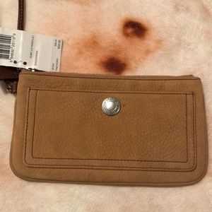 Tan Suede Coach wristlet.